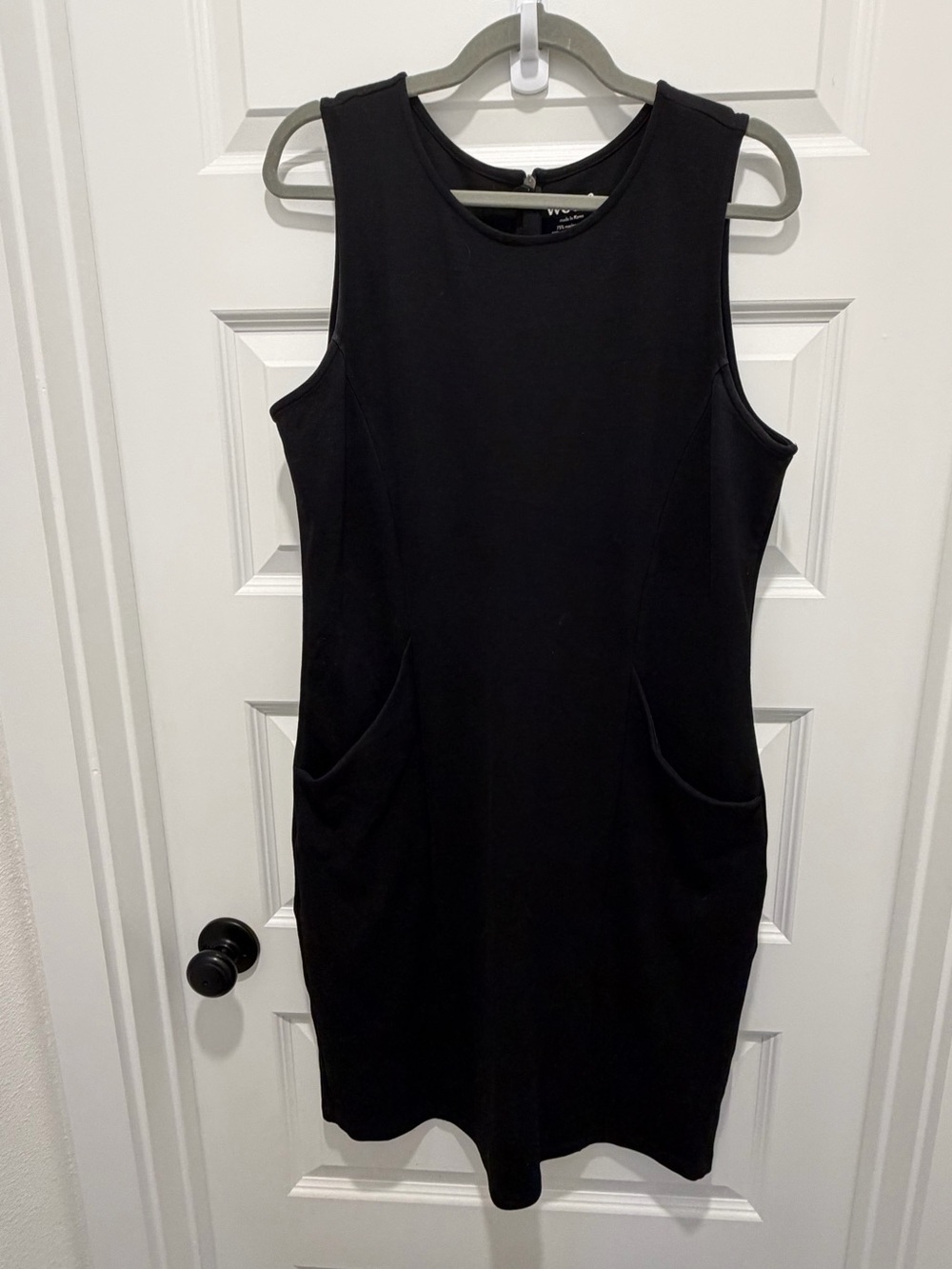 Classic wardrobe staple: Women's Black Sleeveless Sheath Dress - Picture 2 of 5